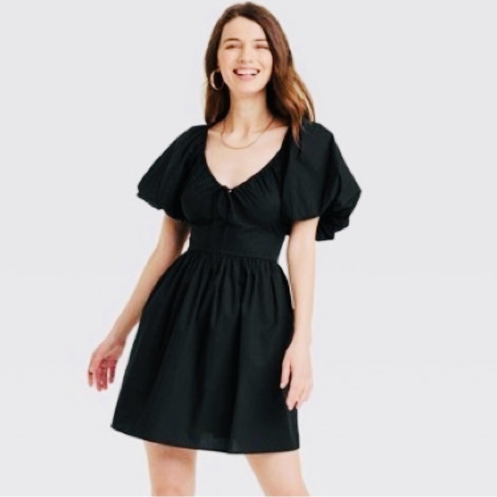 A New Day Woman’s Black Puff Sleeve with pockets Dress size medium